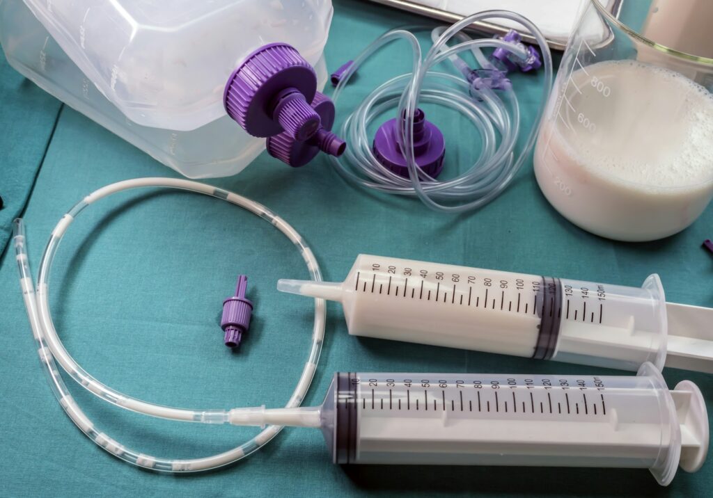 Team of enteral nutrition prepared in hospital, palliative care, conceptual image